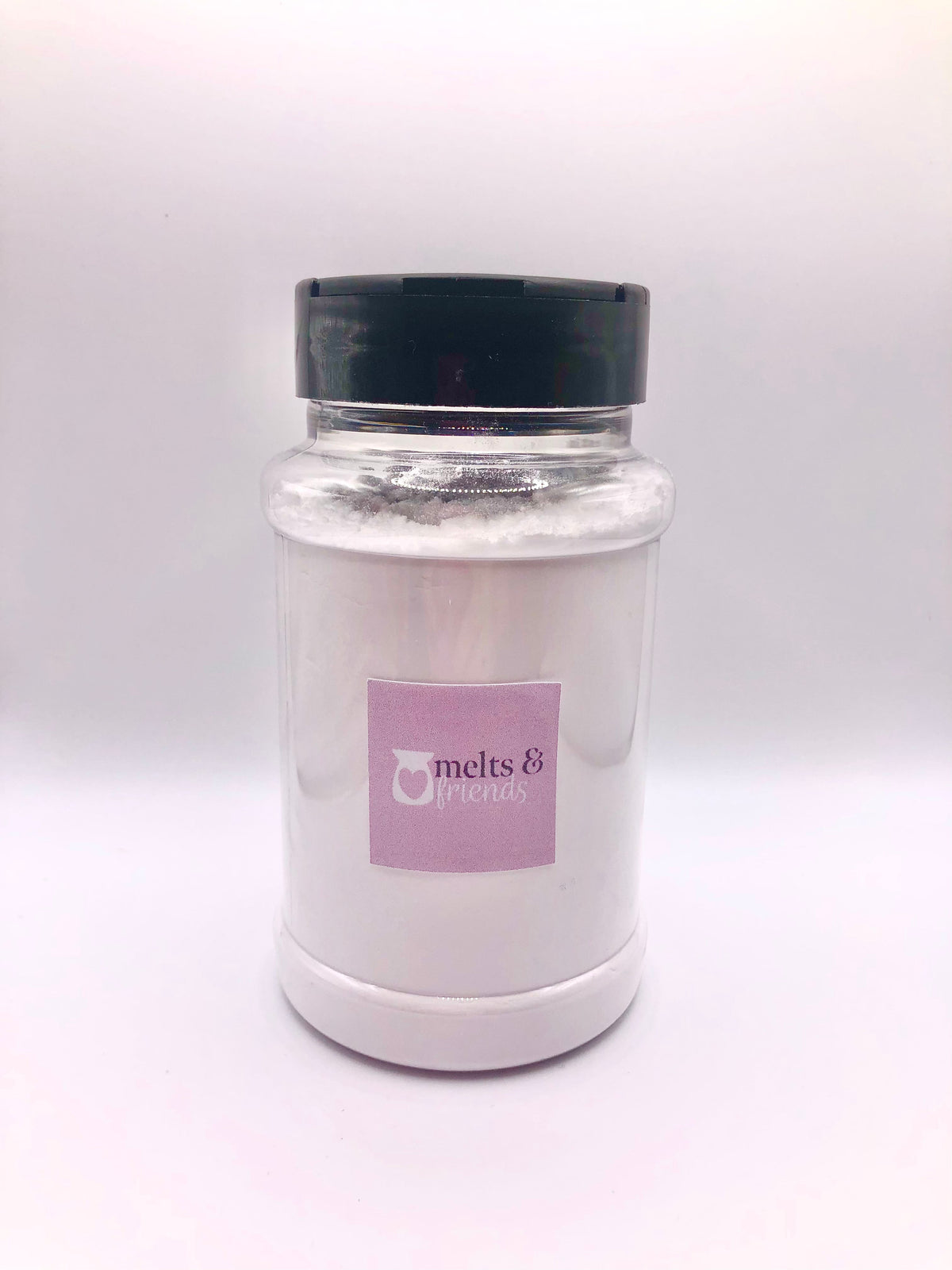 Melts & Friends Christmas carpet freshener powder in a shaker tub