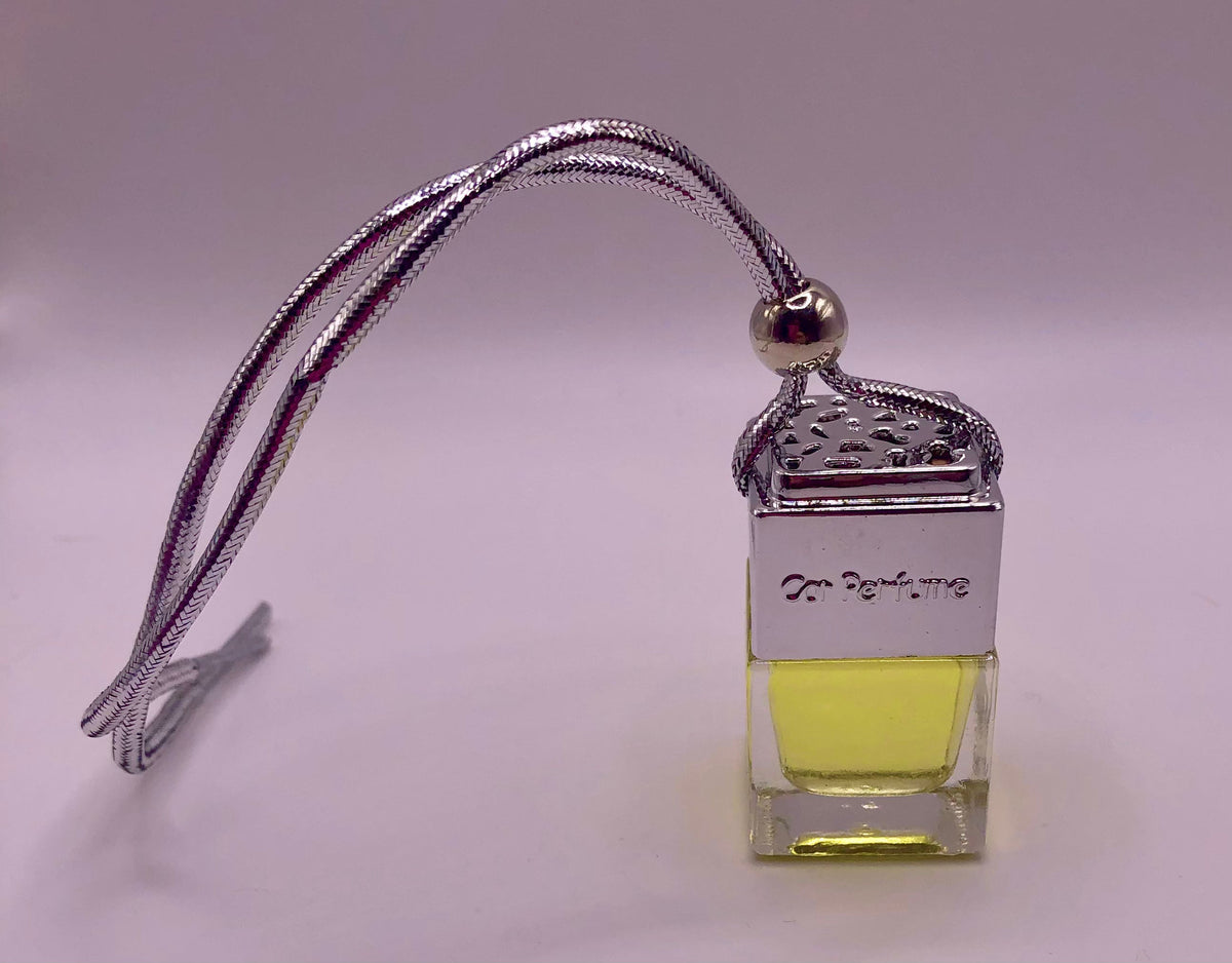 Hanging glass car diffuser with decorative silver cap and festive scented liquid