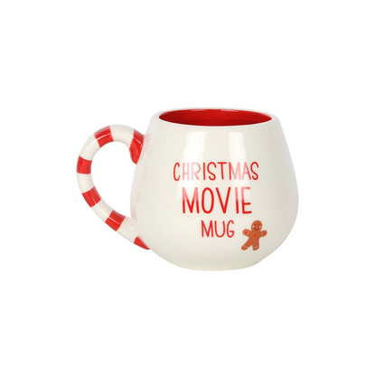 Rounded white Christmas Movie Mug with gingerbread man and candy cane handle