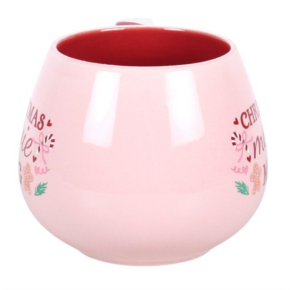 Rounded pink Christmas mug with red interior