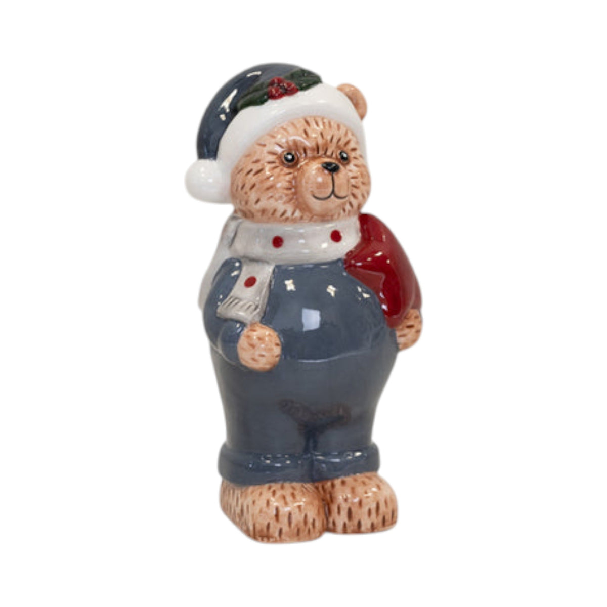Ceramic Christmas teddy bear in blue dungarees and Santa hat carrying a red sack
