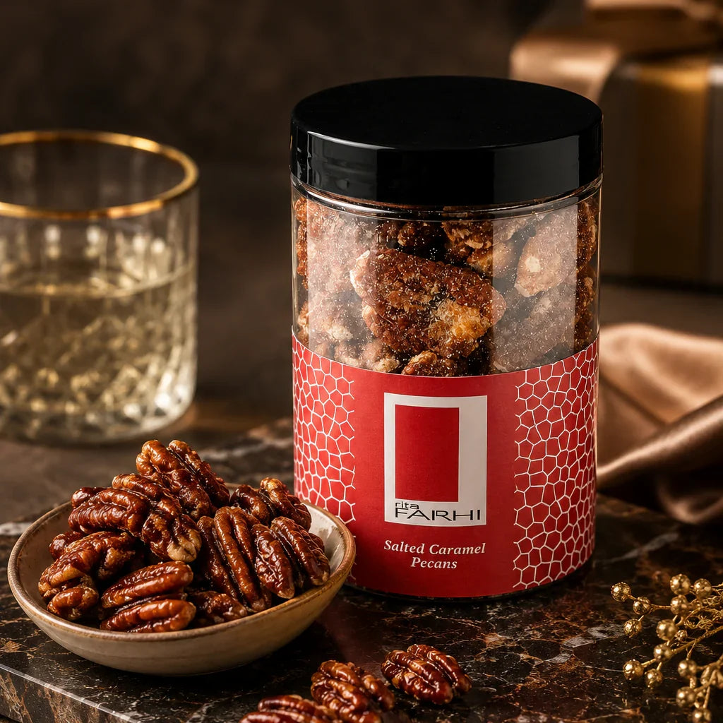 Rita Farhi salted caramel pecans jar beside a bowl of pecans