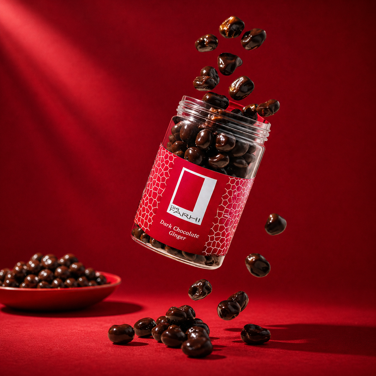 Rita Farhi dark chocolate ginger jar with chocolates falling