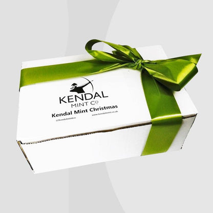 Kendal Mint Christmas gift box tied with green ribbon