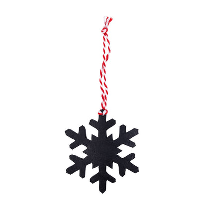 Black upcycled rubber snowflake decoration on red and white twine