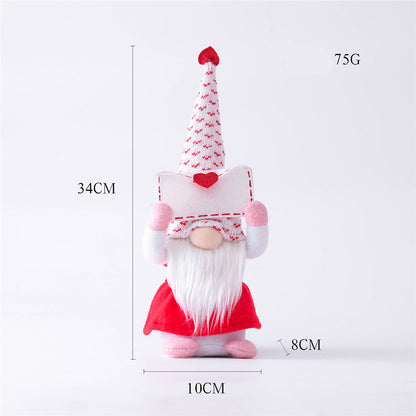 Small Mrs Gnome holding a love letter, 34cm tall