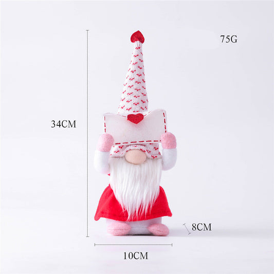 Small Mrs Gnome holding a love letter, 34cm tall