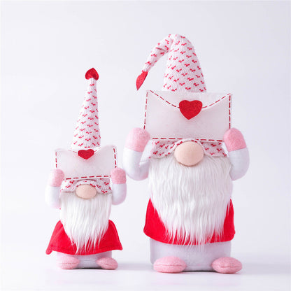 Small and large Mrs Gnome holding love letters