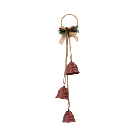 Three rustic red Christmas bells hanging from a twine hoop with bow, pine sprig and berries