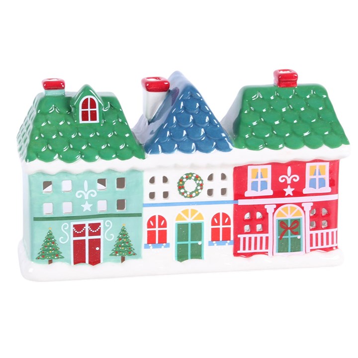 Christmas village tealight and incense cone holder with three colourful houses and cut-out windows