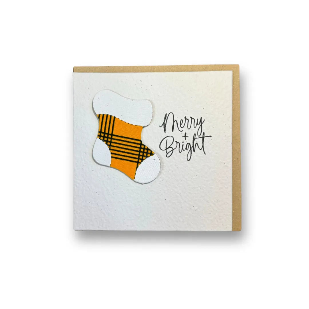 Handmade Merry and Bright Christmas card with kitenge fabric stocking