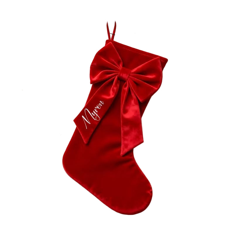 Large red Christmas stocking with an oversized bow